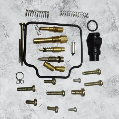Detailed view of TVS Apache 200 carburetor main jet and O-rings in repair kit.